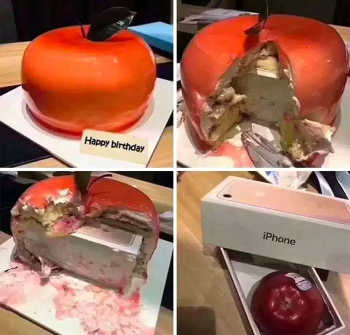 A birthday meme showing a birthday cake that looks like an apple. As the cake is cut, it reveals an actual iPhone box inside, but the box contains a real apple. The caption reads "Happy birthday." Perfect for sharing a humorous take on birthday surprises.