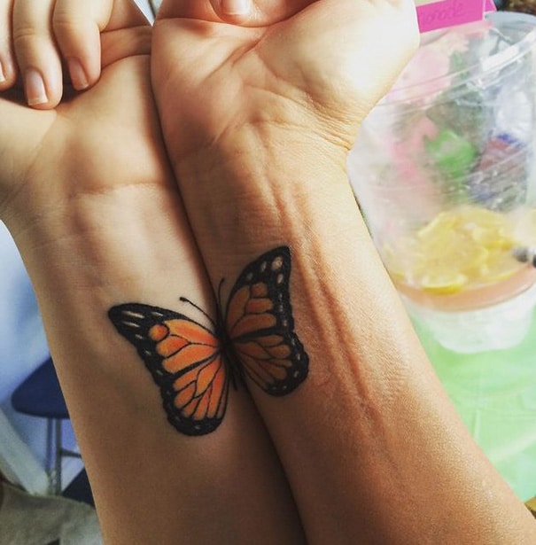 Mother-Daughter Tattoos: Hands Creating a Butterfly