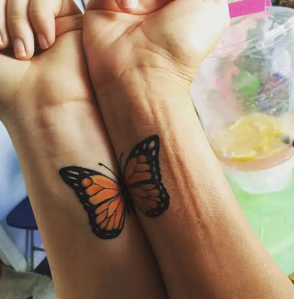 Mother-Daughter Tattoos: Hands Creating a Butterfly