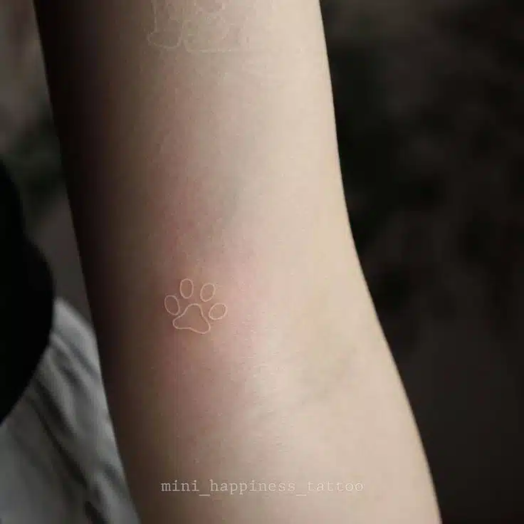 White pet lover tattoo idea