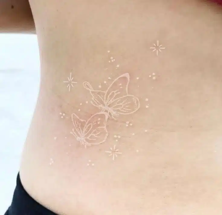 Simple white Butterfly Tattoo idea