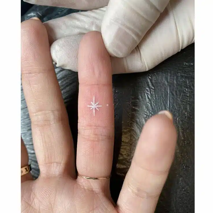 White Tattoo idea on Finger 
