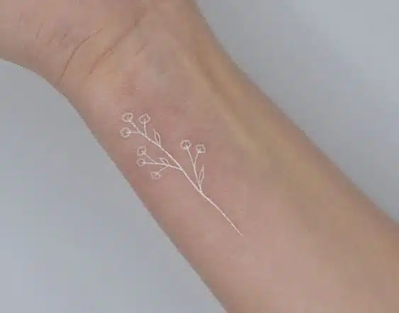 White flower tattoo idea