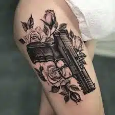 Gun tattoo idea for women
