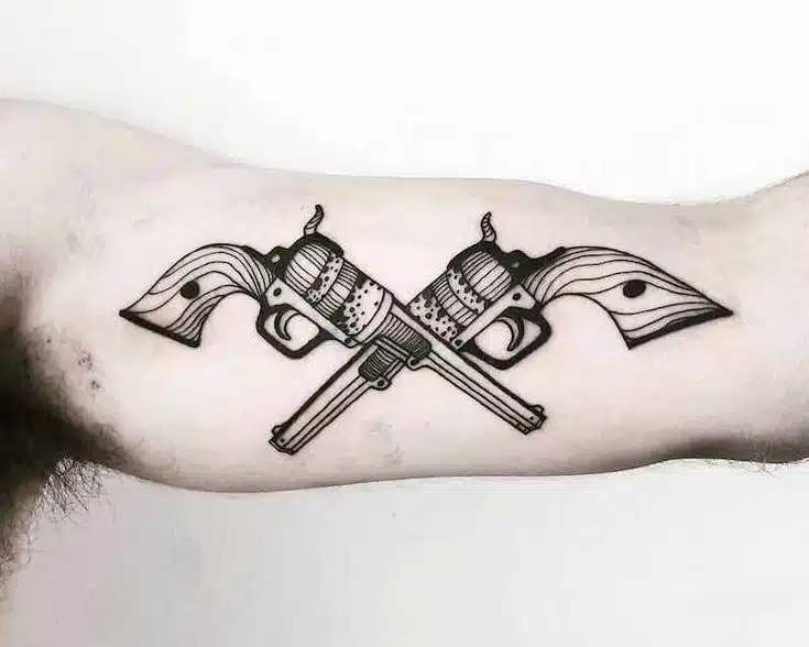 Gun tattoo idea on hand