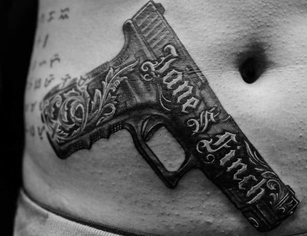 Gun tattoo idea for women
