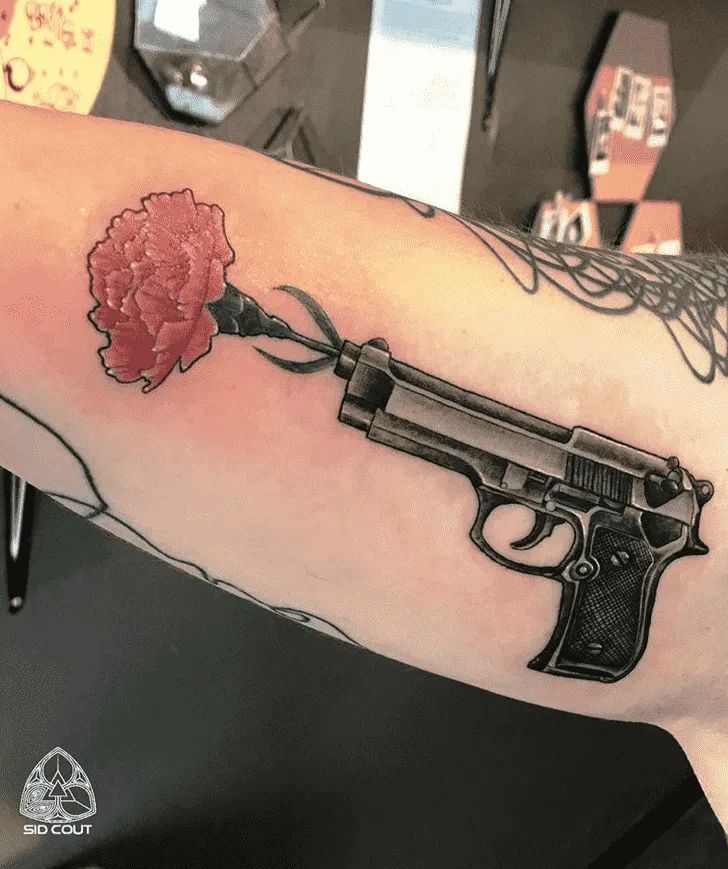 Flower gun tattoo idea