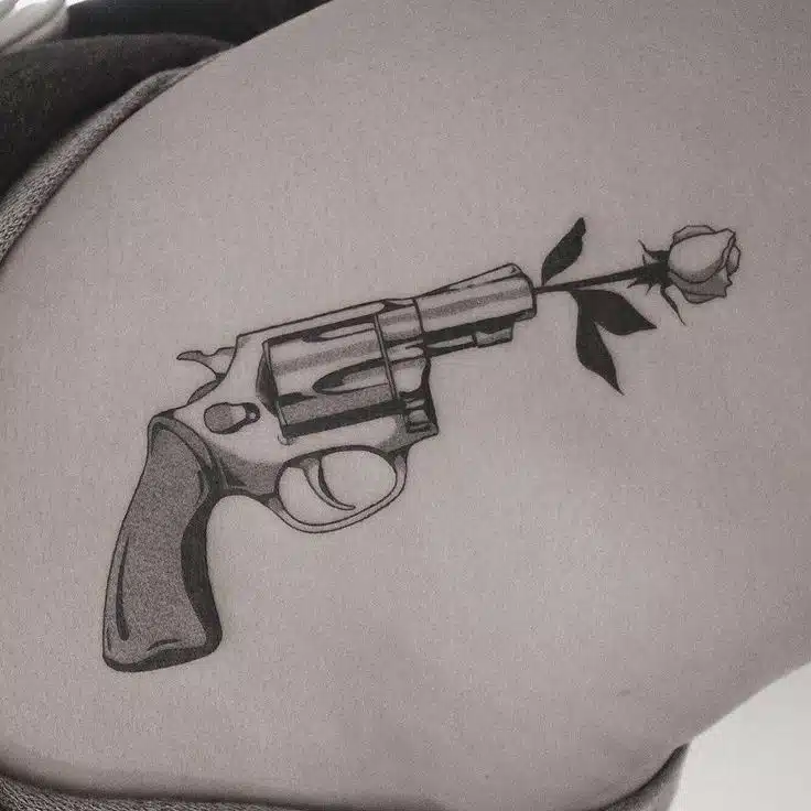 Gun Tattoo idea for women