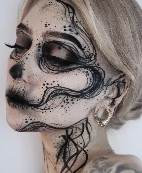 Black pencil art on face