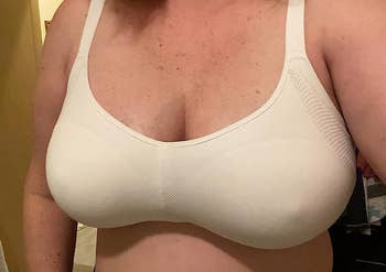 a reviewer wearing the butterscotch bra