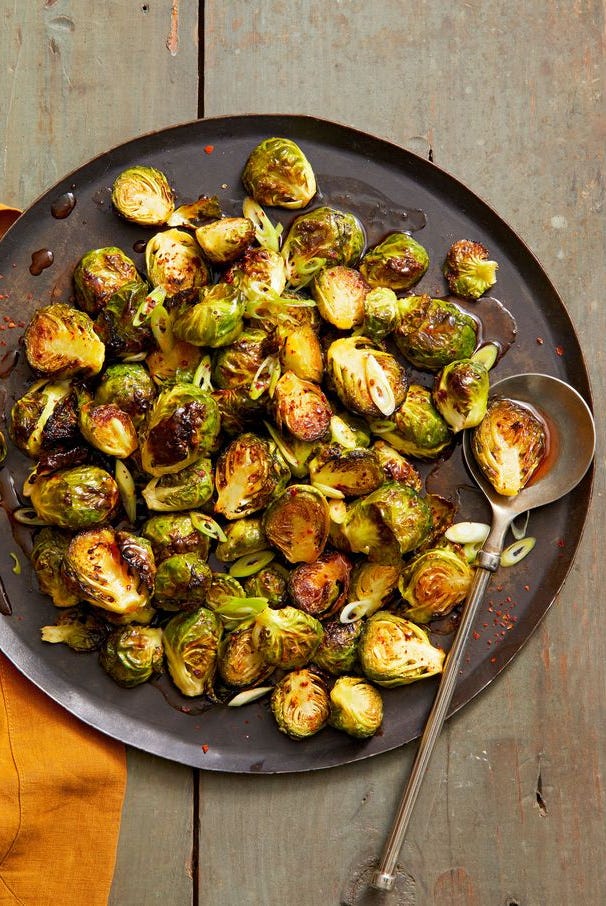 brussels sprouts with chili sauce on top