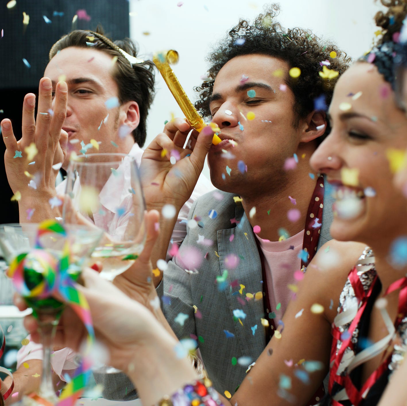 friends at a party with confetti