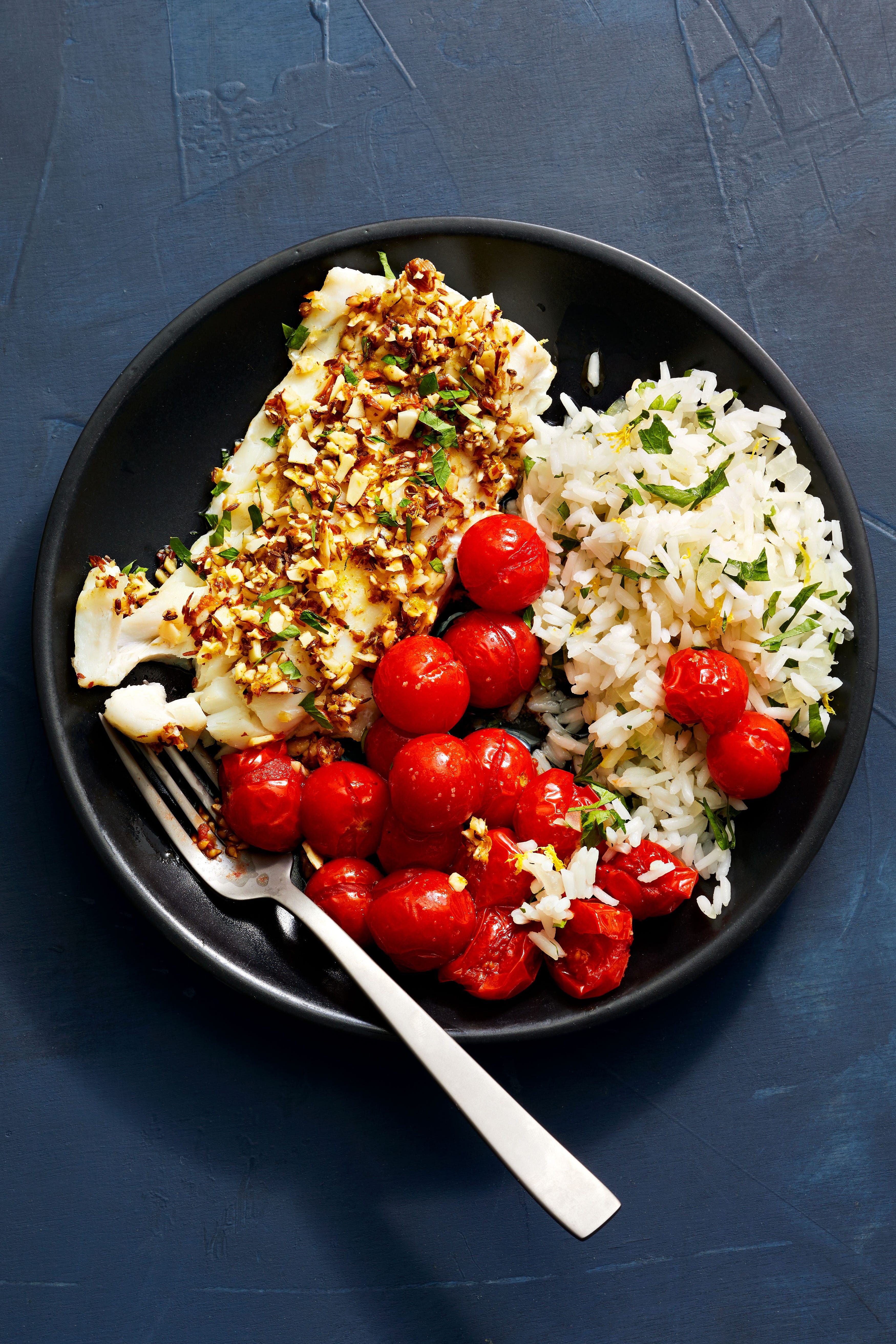 tomato roasted cod with spiced almonds