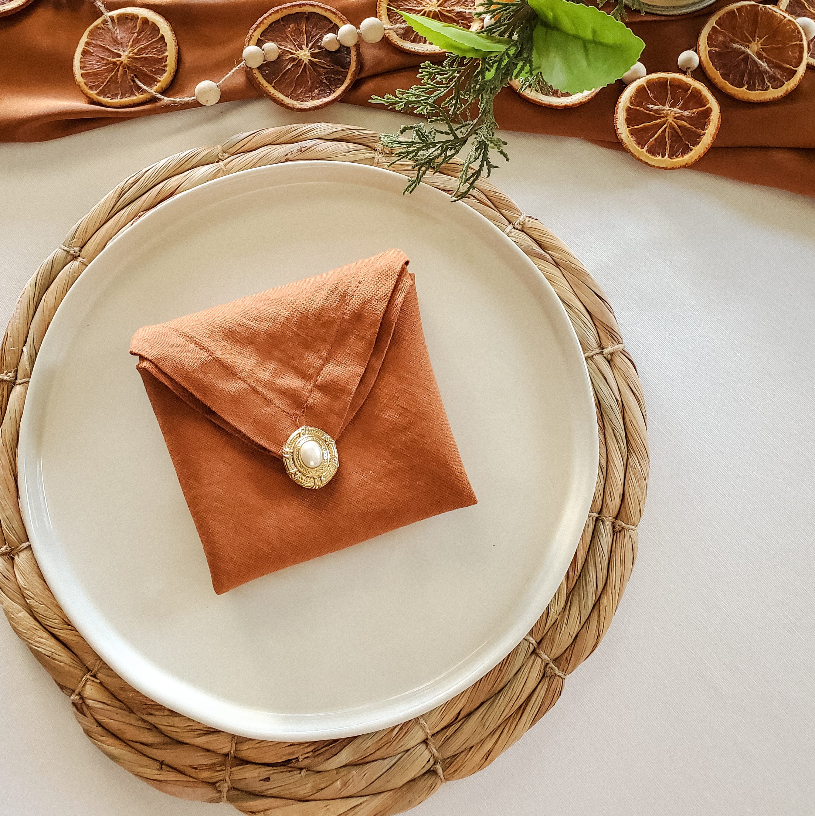 envelope napkin fold, orange