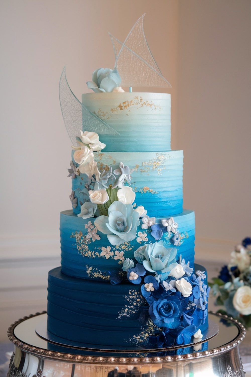 Ocean Breeze Floral Cake – Elegant blue cake with cascading ocean-hued flowers.
