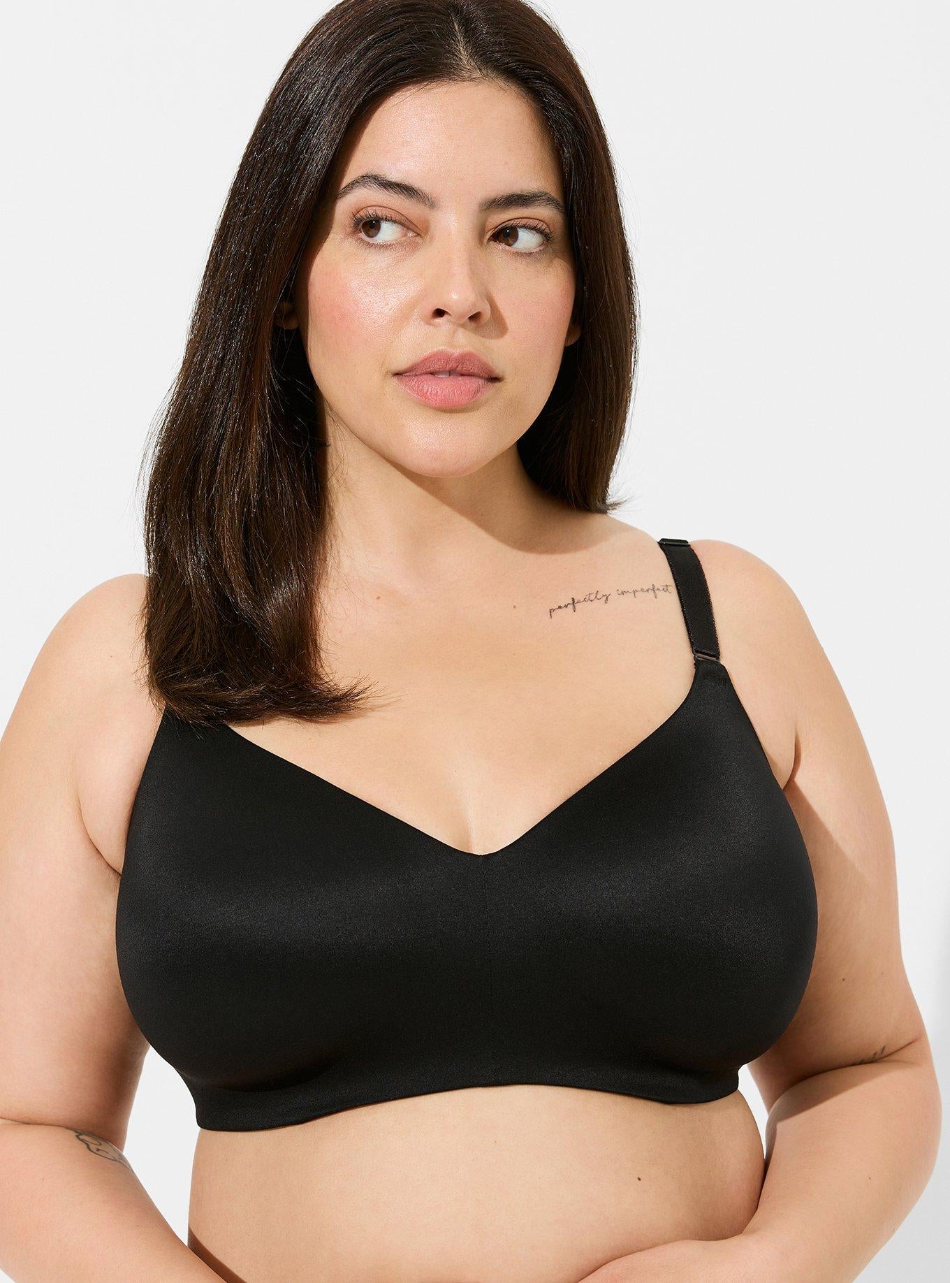 Model posing in black wireless bra