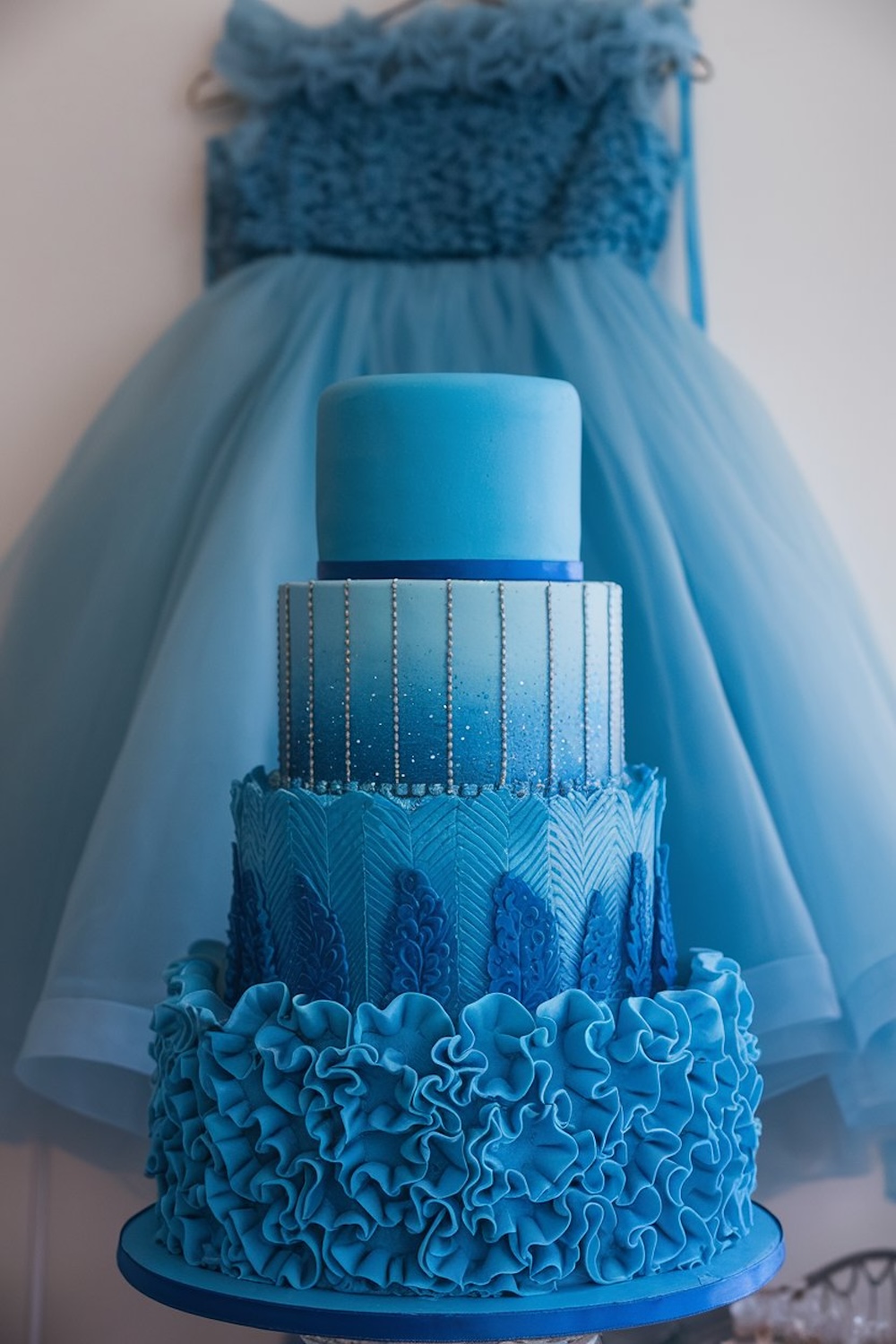 Ruffled Dream Cake – Blue birthday cake with dramatic ruffled frosting.
