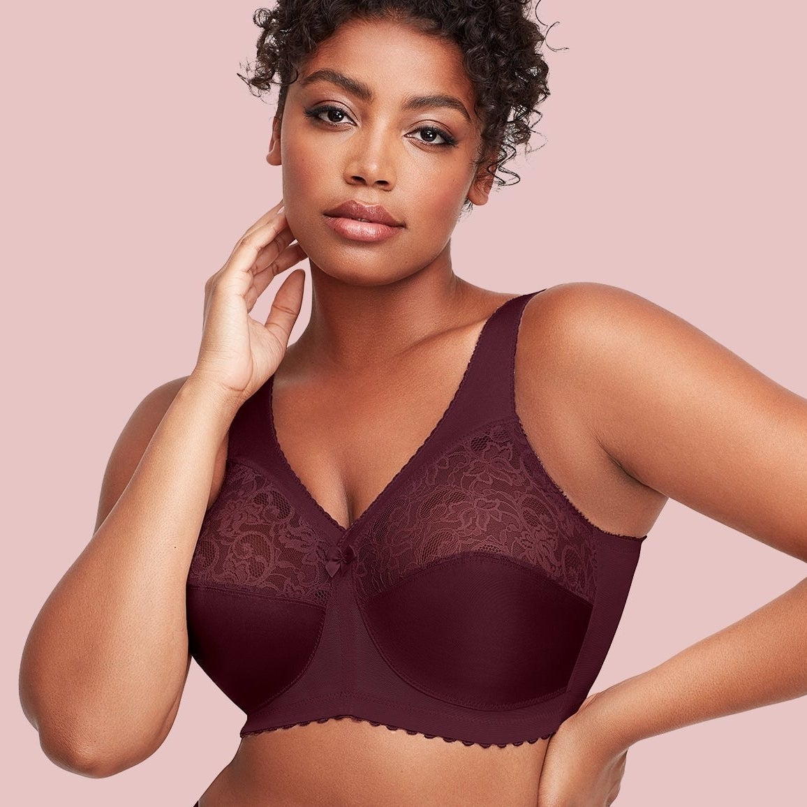 a model wearing the maroon bra