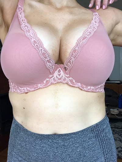 Reviewer wearing the pink bra