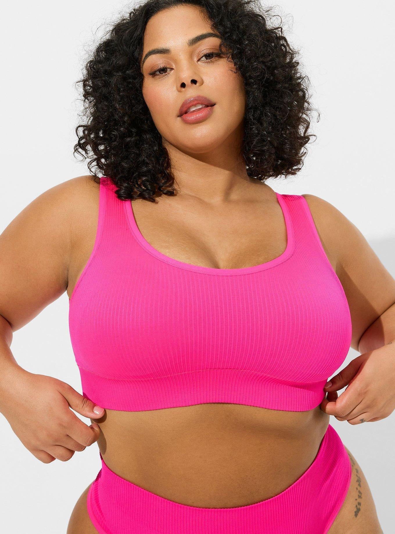 model wearing pink ribbed bralette