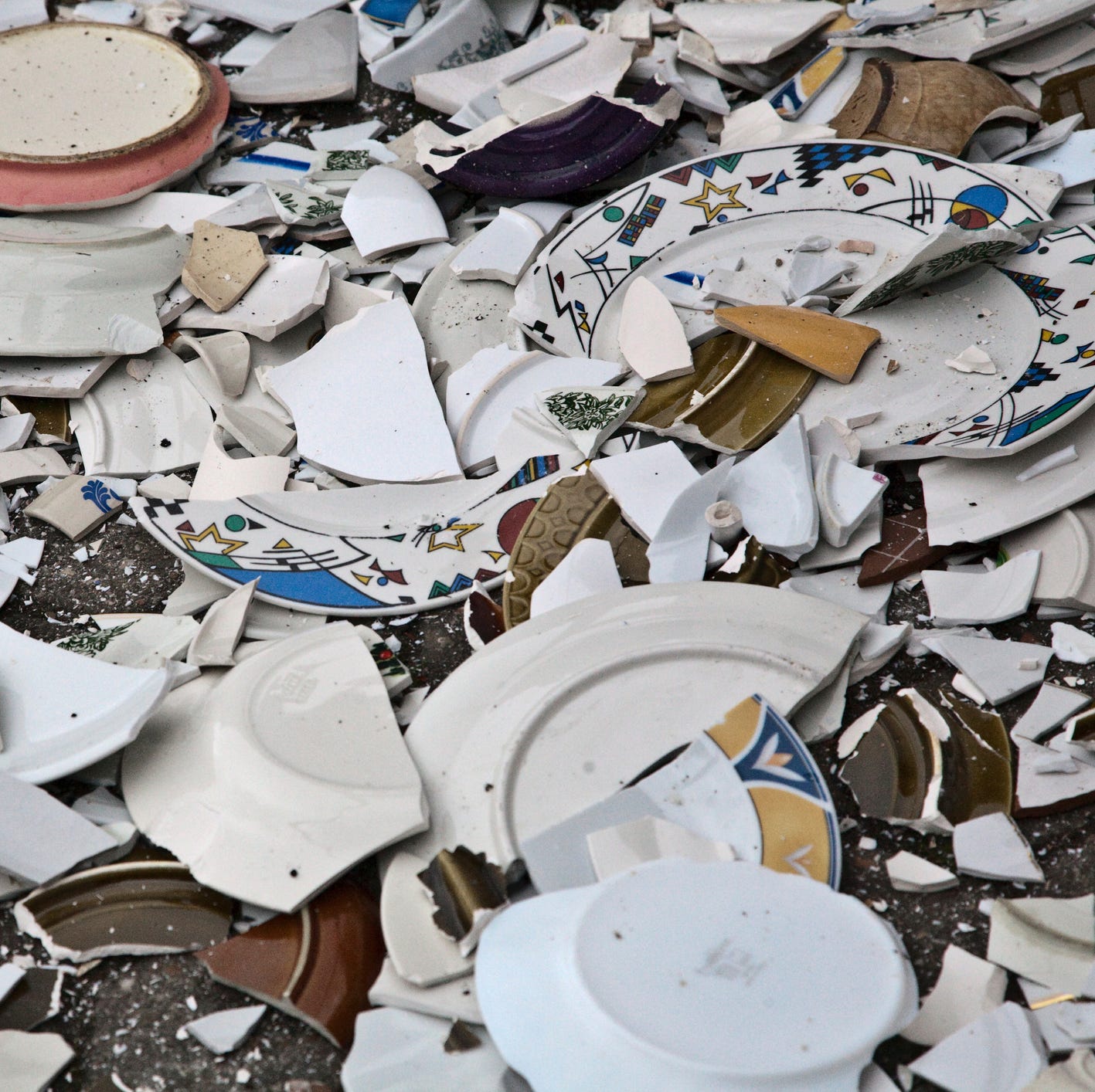 high angle view of broken plates