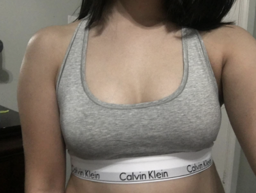 Reviewer wearing gray bra