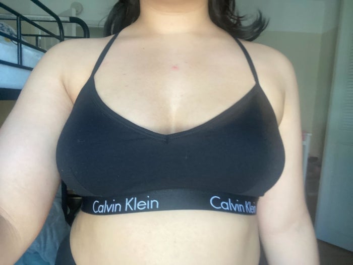 Reviewer wearing the black bra