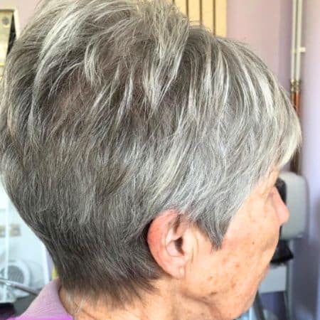 Classic Silver Tapered Pixie Haircut, side view.