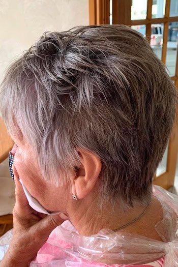 Layered Gray Pixie Haircut, side view.