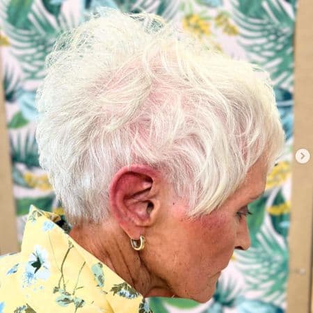 White Wispy Textured Pixie for Thin Hair Haircut, side view.