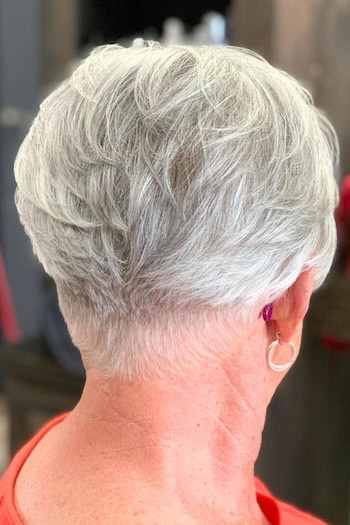 Silver Layered Tapered Pixie Haircut, back view.