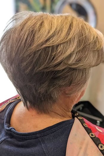 Golden Brown Graduated Pixie Haircut, back view.