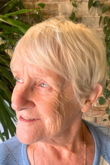 Pale Blonde Pixie with Wispy Bangs Haircut