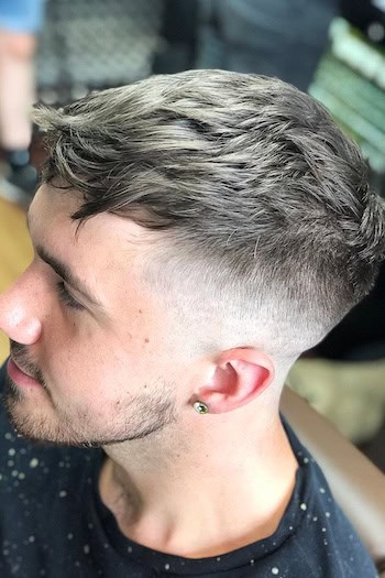 Textured Top with Fade Men's Haircut, side view.