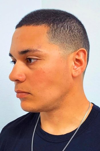 Buzz Cut with Clean Low Fade Men's Haircut, side view.