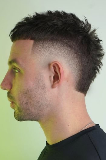 Faux Hawk with Taper Fade Men's Haircut, side view.