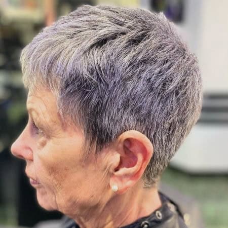 Short Silver Periwinkle Tapered Pixie Haircut, side view.