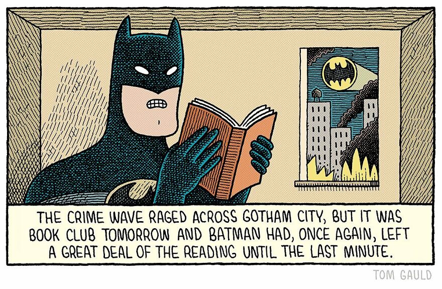 Batman is reading a book inside a room while the Bat-Signal shines through the window, indicating trouble outside.