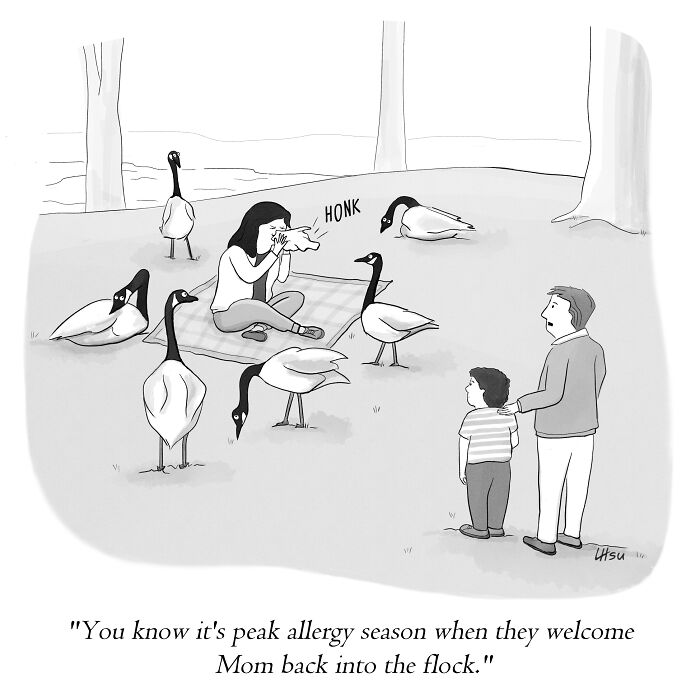 A woman sitting on a picnic blanket sneezes loudly as several geese gather around her. A man and a child watch from a distance, amused by the scene.