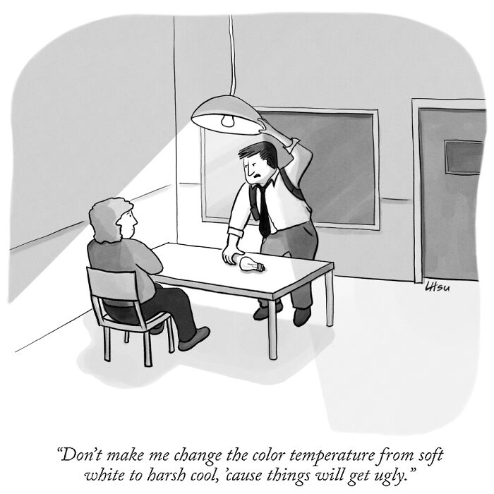 A man in a suit threatens to change a lightbulb during an interrogation, telling the seated person things will get ugly if the lighting goes harsh.