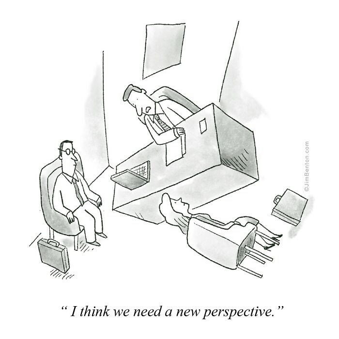In a business office, a boss says, “I think we need a new perspective,” while a woman in a chair has fallen completely backward onto the floor. Another man sits nearby unfazed, and the boss continues as if nothing unusual has happened.